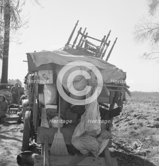 Migrant family outfit on U.S. 99 between Bakersfield, California, and the Ridge, 1939. Creator: Dorothea Lange.