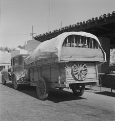 Migrant family stopped at the California-Arizona state line, Yuma, Arizona, 1937. Creator: Dorothea Lange