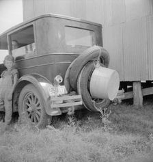 Migrant family's car near Brownsville, Texas, 1936. Creator: Dorothea Lange