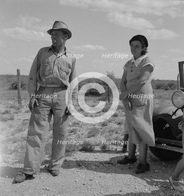 Migrant oil worker and wife near Odessa, Texas, 1937. Creator: Dorothea Lange.