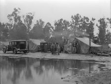 Migrant pea pickers camp in the rain, California, 1936. Creator: Dorothea Lange