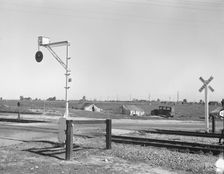 Migrants tents..., along the right of way of the Southern Pacific, Near Fresno, California, 1939. Creator: Dorothea Lange