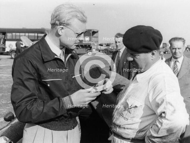 Mike Hawthorn with a model car, c1953-c1958. Artist: Unknown
