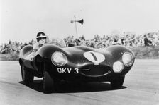 Mike Hawthorn driving a D Type Jaguar, c1955-c1956