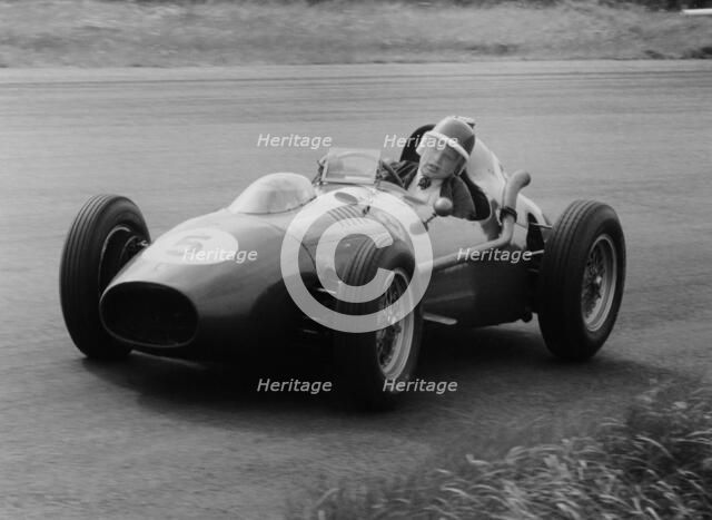 Mike Hawthorn in the Dutch Grand Prix, Zandvoort, 1958. Artist: Unknown