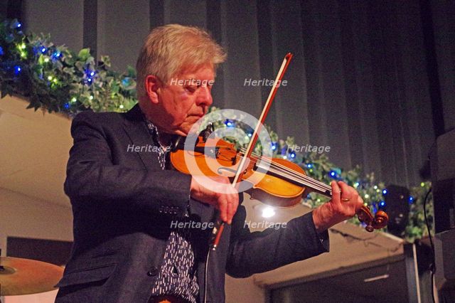 Mike Piggott, East Grinstead Jazz Club, Apron Café, Chequer Mead Theatre, West Sussex, April 2025. Creator: Brian O'Connor.