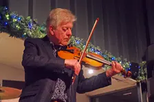 Mike Piggott, East Grinstead Jazz Club, Apron Café, Chequer Mead Theatre, West Sussex, April 2025. Creator: Brian O'Connor