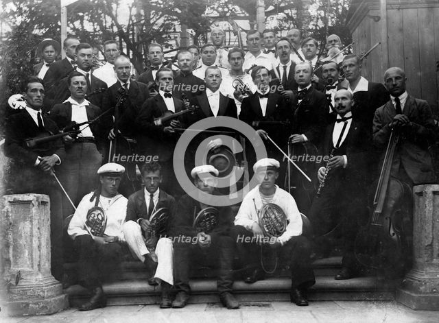 Mikhail Alekseevich Pavlov with the Members of a Symphony Orchestra, 1920s. Creator: Unknown.