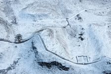 Milecastle 39 and Sycamore Gap Tree on Hadrian's Wall in the snow, Northumberland, 2018. Creator: Emma Trevarthen