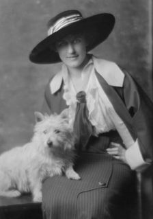 Milholland, Inez (Mrs. Eugene Boissevain), with dog, portrait photograph, 1914. Creator: Arnold Genthe