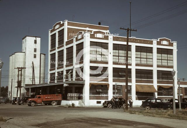 Milk and butter fat receiving depot and creamery, Caldwell, Idaho, 1941. Creator: Russell Lee.