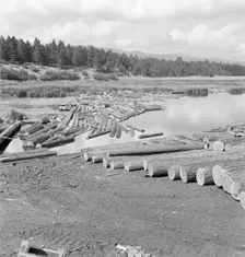 Mill pond, Klamath River beyond, Keno, Klamath County, Oregon, 1939. Creator: Dorothea Lange