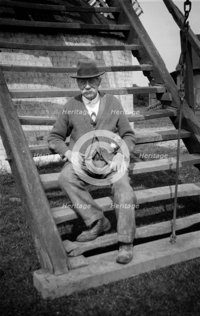 Miller outside his windmill, Outwood, Surrey, 1933. Artist: HES Simmons