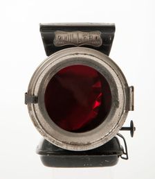 Miller oil rear lamp circa 1906. Creator: Unknown