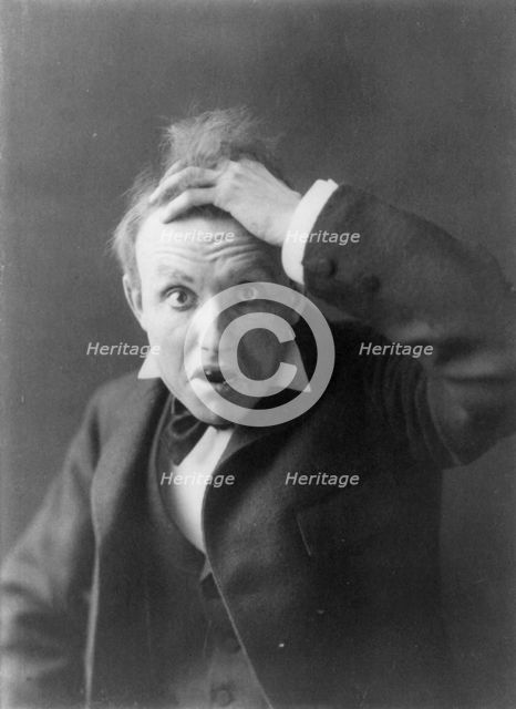 Mills Thompson, head-and-shoulders portrait, facing front, posed as toothless..., c1890 to c1910. Creator: Frances Benjamin Johnston.