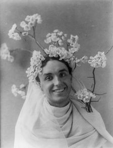 Mills Thompson, head-and-shoulders portrait, facing right, with cherry..., between c1890 and c1910. Creator: Frances Benjamin Johnston