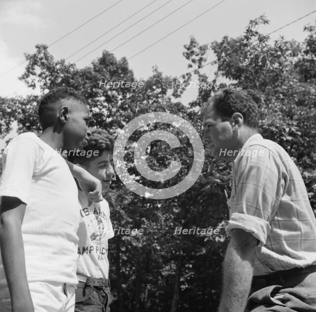 Milton Reiner, program director at Camp Nathan Hale, Southfields, New York, 1943 Creator: Gordon Parks.