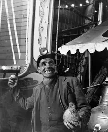Miner at a fairground, Conisbrough, near Doncaster, South Yorkshire, 1955. Creator: Michael Walters