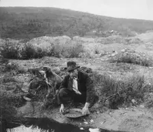 Miner panning gold, 1916. Creator: Unknown