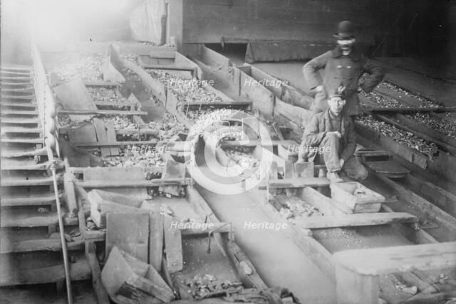 Miners among coal boxes, S. Wilkes-Barre, PA., 1912. Creator: Bain News Service.