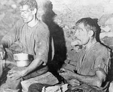 Miners enjoying a snack in the Brinsley Colliery pit, Nottinghamshire, 1913. Creator: Rev FW Cobb