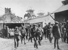Miners leaving the pithead after the expiration of their strike notices 1915