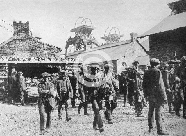 'Miners leaving the pithead after the expiration of their strike notices', 1915. Artist: Unknown.