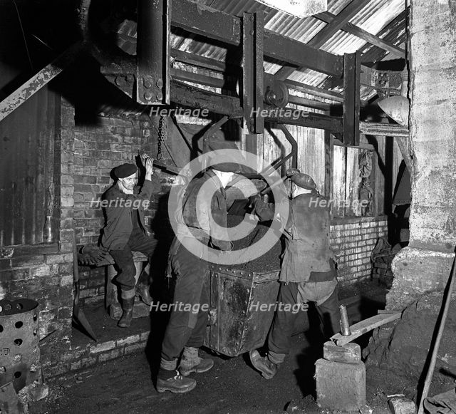 Miners working in Mitchell Main Colliery near Barnsley, South Yorkshire, 1956. Creator: Michael Walters.