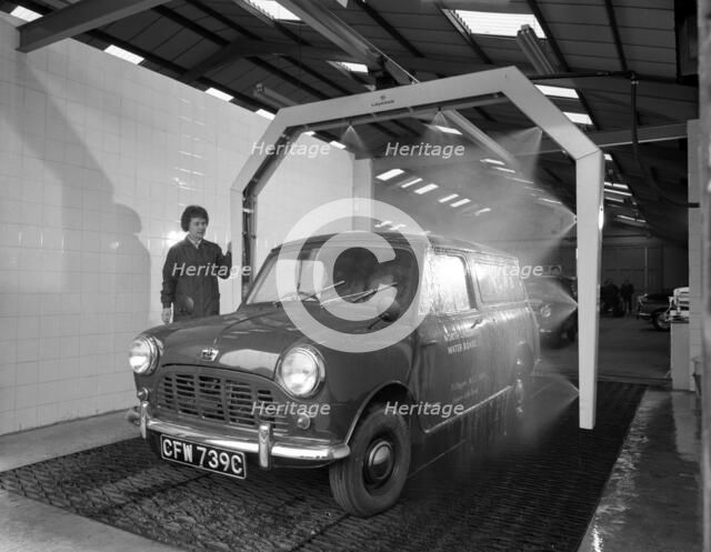 Mini van being washed in a car wash, Co-op garage, Scunthorpe, Lincolnshire, 1965.  Artist: Michael Walters