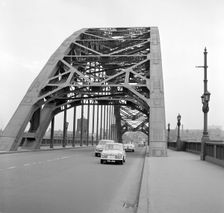 Mini on the 1959 Mobil Economy Run, Tyne Bridge in Newcastle. Creator: Unknown
