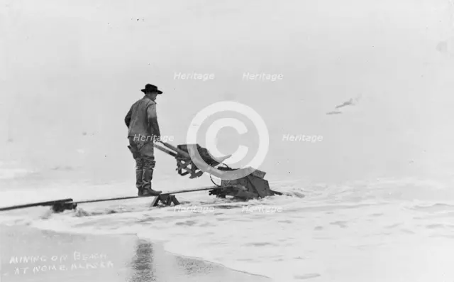 Mining on beach, between c1900 and c1930. Creator: Unknown.