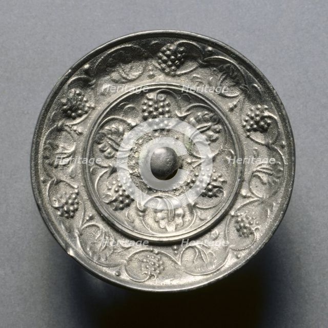 Miniature Mirror with Grape Decoration, 7th century. Creator: Unknown.