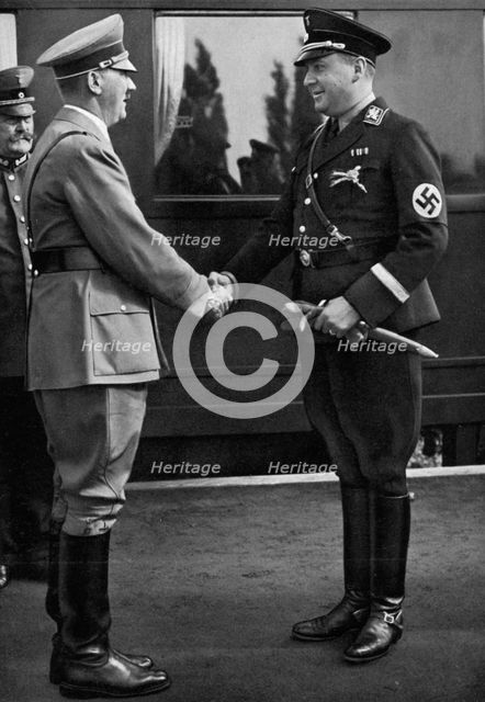 Minister Darré greets the Führer during Erntedankfestes (Harvest Festival), 1936. Artist: Unknown