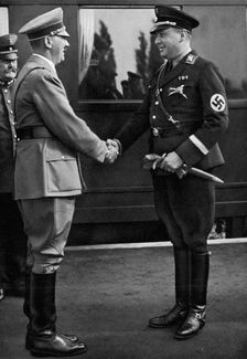 Minister Darré greets the Führer during Erntedankfestes (Harvest Festival), 1936