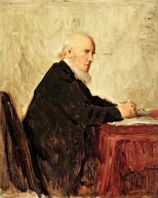 Minister Seated At Table, c1890-1910. Creator: George Reid