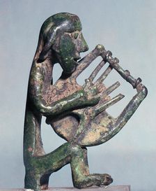 Minoan bronze of a harpist