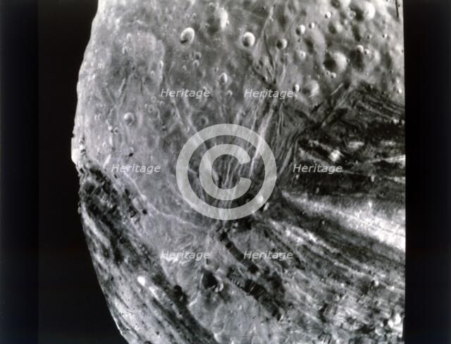 Miranda, one of the moons of Uranus, seen from Voyager 2, 24 January 1986. Creator: NASA.