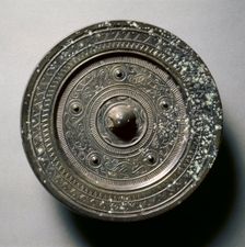 Mirror with Concentric Circles, an Immortal, and Auspicious Animals, 1st century BC-1st century AD. Creator: Unknown