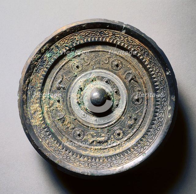 Mirror with Concentric Circles, an Immortal, and Auspicious Animals, 1st century. Creator: Unknown.