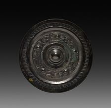 Mirror with Concentric Circles and Auspicious Animals, 206 BC - AD 220. Creator: Unknown
