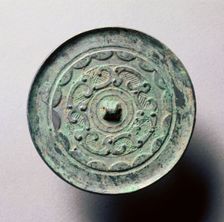 Mirror with Continuous Arcs and Quasi- Dragons, late 3rd century BC-1st century. Creator: Unknown