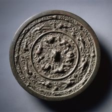 Mirror with Auspicious Animals, Celestial Horses, and Grapevines, early 1100s-mid-1200s. Creator: Unknown