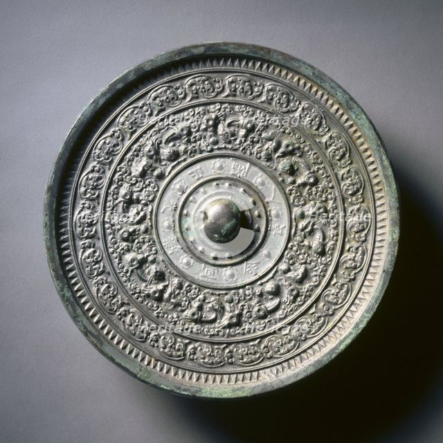 Mirror with Deities and Animals in Concentric Circles, late 6th-early 7th century. Creator: Unknown.