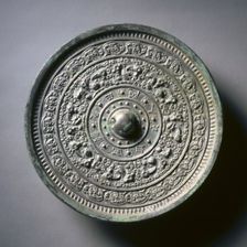 Mirror with Deities and Animals in Concentric Circles, late 6th-early 7th century. Creator: Unknown
