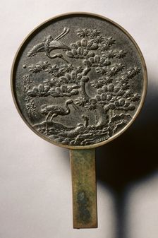 Mirror with Handle, Decorated with Pine Tree and Crane, early 17th - mid 19th century. Creator: Unknown
