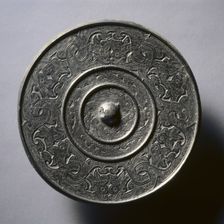Mirror with Interlacing Dragons, early 7th-early 10th century. Creator: Unknown