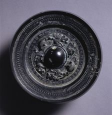 Mirror with Two Dragons and a Tiger, 3rd Century. Creator: Unknown