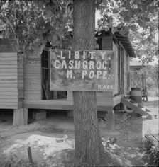 Mississippi grocery store, 1937. Creator: Dorothea Lange