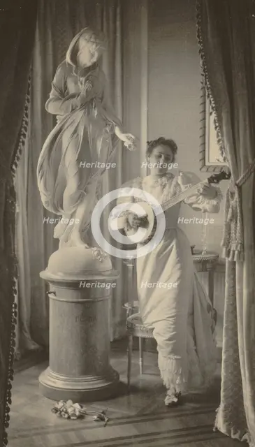"Miss Apperson" playing banjo...Sen. George Hearst's residence, Washington, D.C., 1895. Creator: Frances Benjamin Johnston.