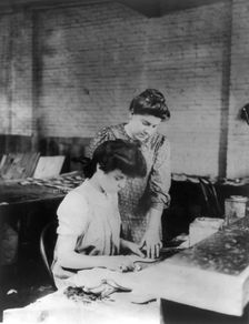 Miss Bessie Prince and Miss Ella Parrott working in a shoe factory, Lynn, Mass., (1895?). Creator: Frances Benjamin Johnston